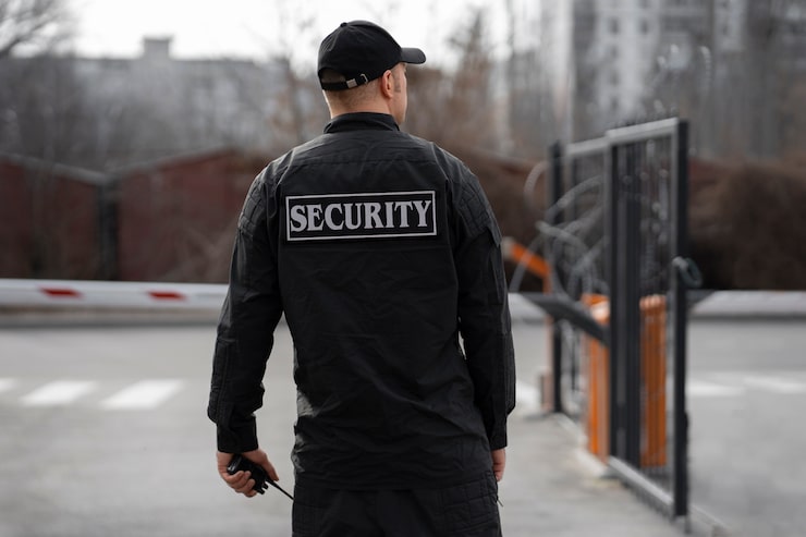 EyeQ security officer on patrol at a site gate